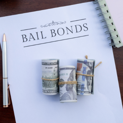 Concept image of a bail bond contract and money