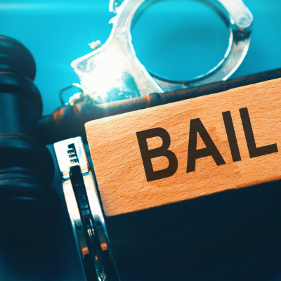 Stylized US map suggesting differing bail reform approaches