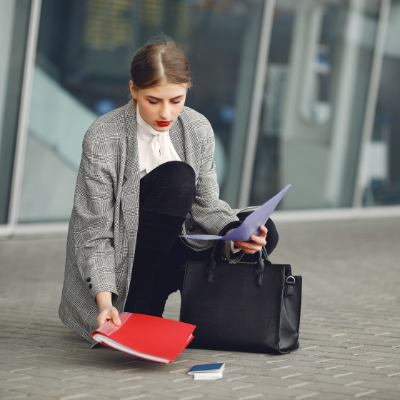 Traveler at airport looking at court bond paperwork