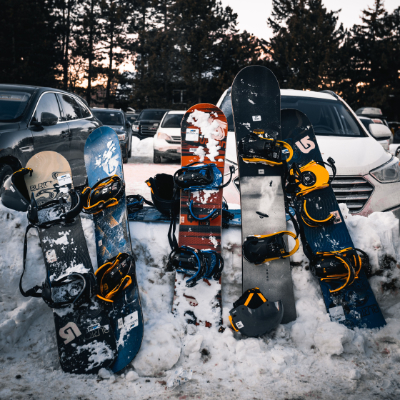 Ski gear, car, and hotel representing logistics after an arrest